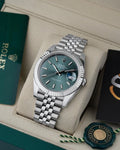 Stainless steel green dial wrist watch
