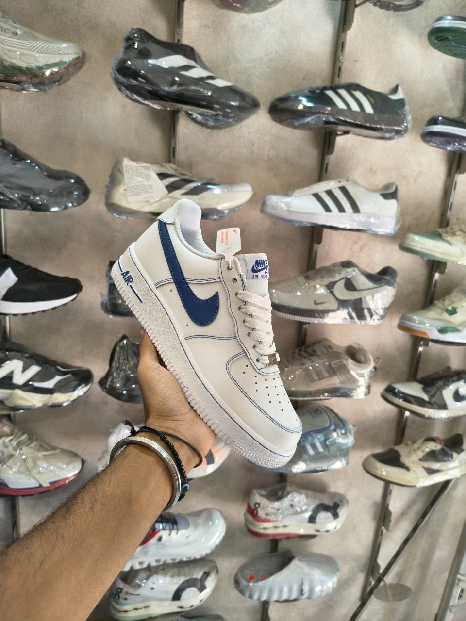 White and blue low-top casual sneakers