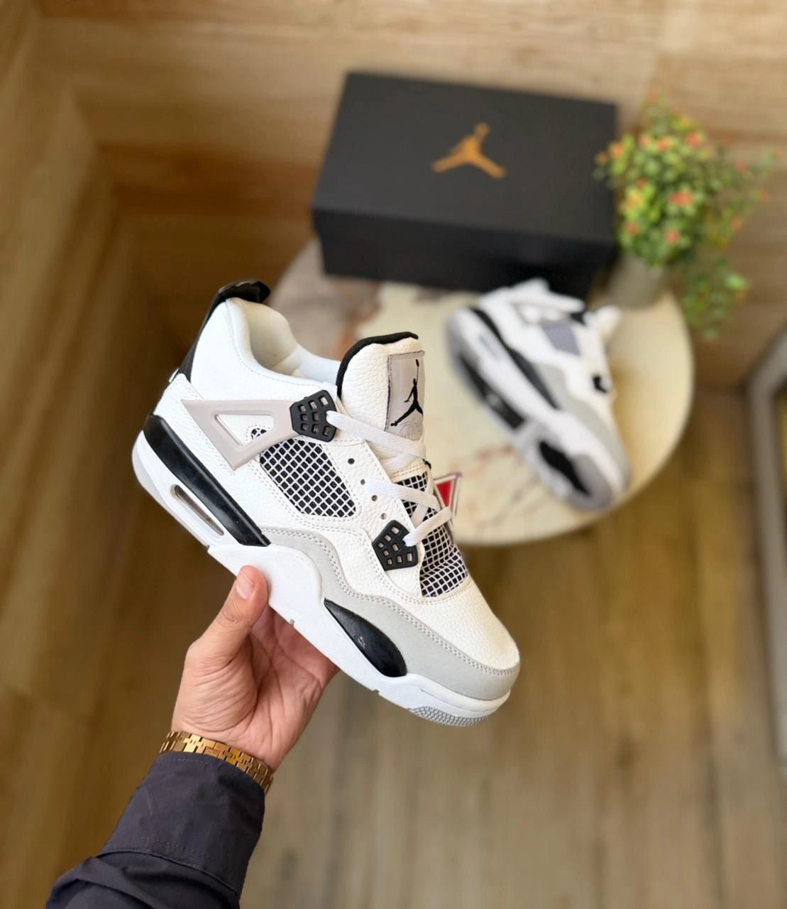Air Jordan 4 Retro Black Army sneakers front view