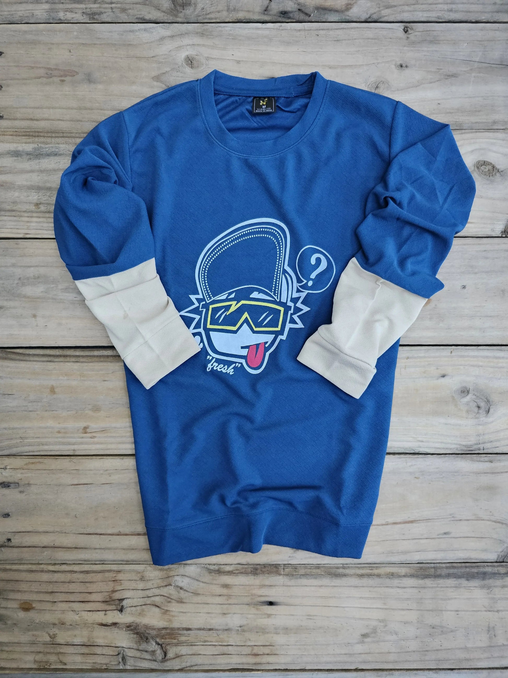 close‑up of anime print design on T‑shirt