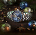 Silver metal case skeleton watch with blue dial