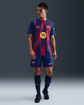 Model wearing FC Barcelona home jersey