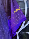 Purple Barcelona soccer jersey with gold crest