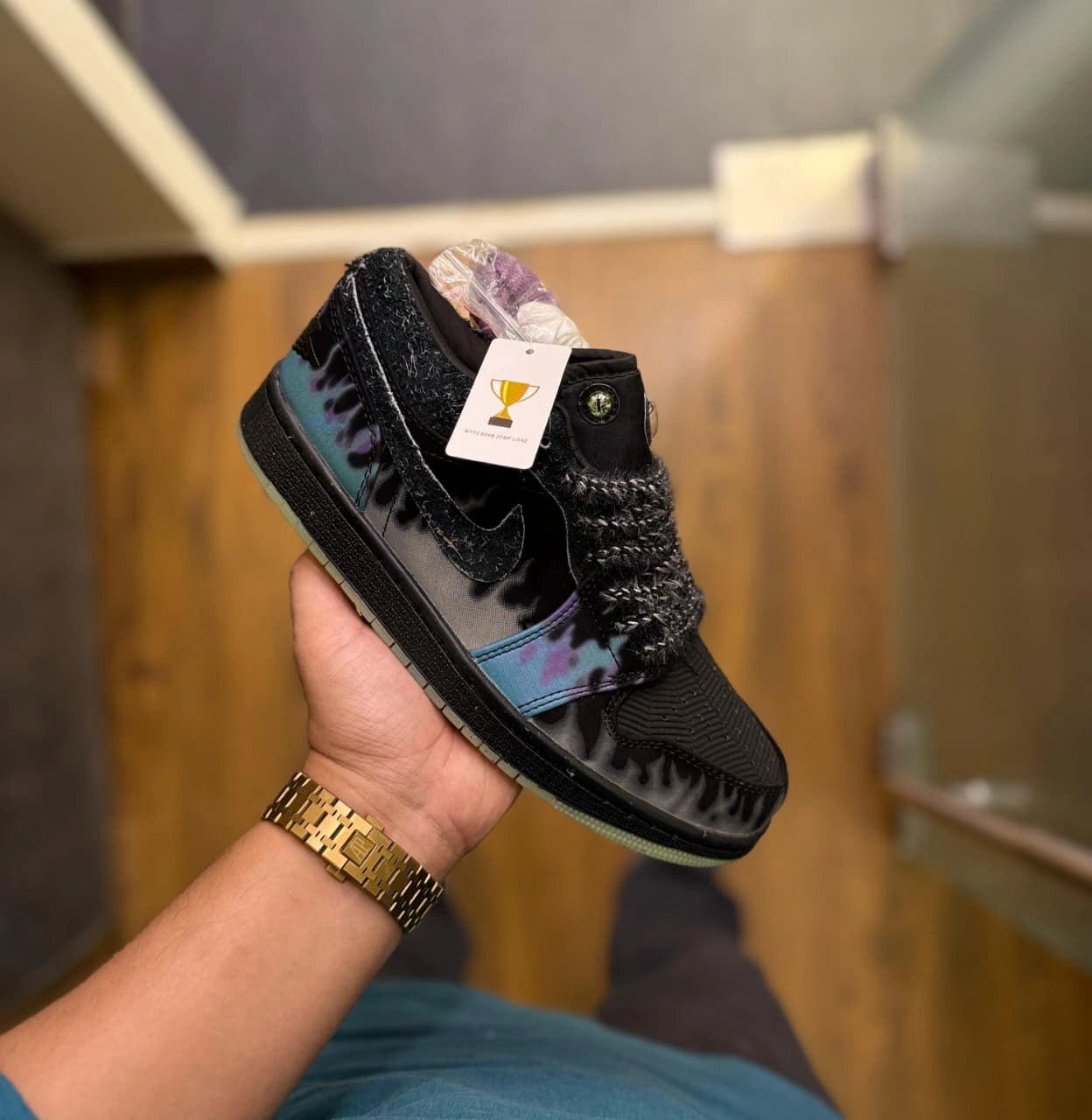 Black low top sneakers with Halloween inspired design