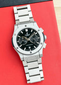 Black dial analog chronograph watch