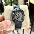 Square case black open-work dial watch