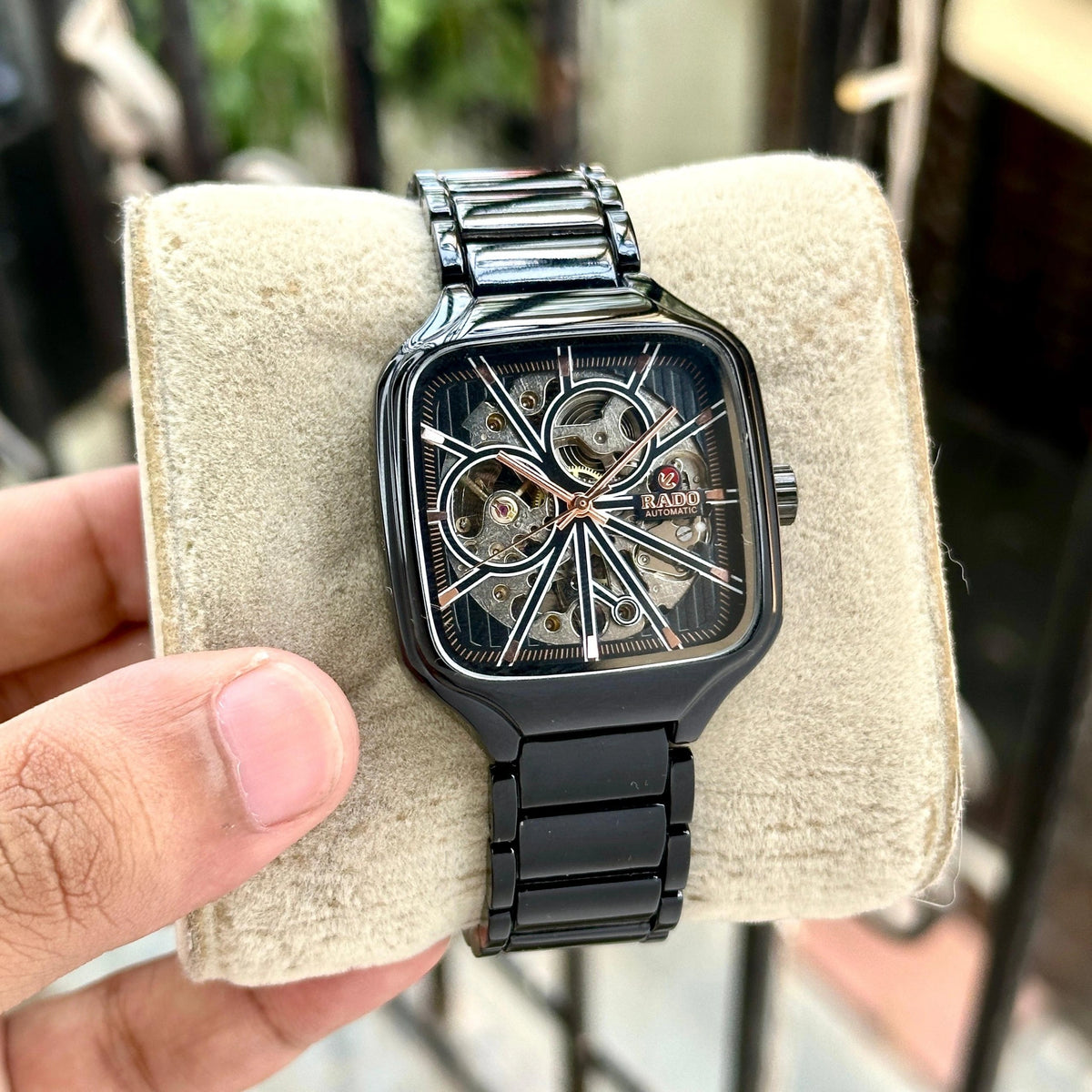 Square case black open-work dial watch