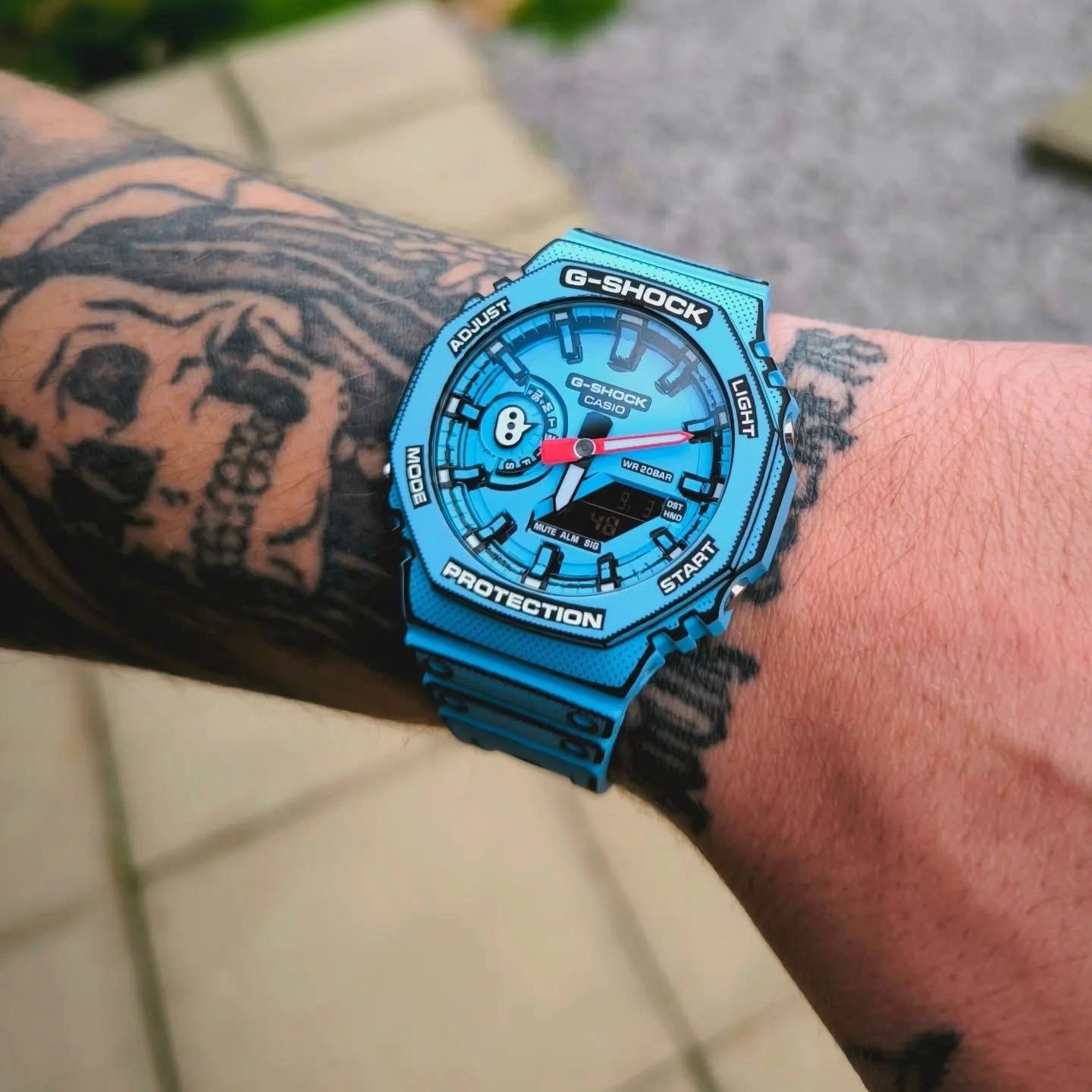 Blue analog-digital sports watch with resin strap