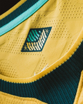 Brazil yellow soccer jersey with team crest