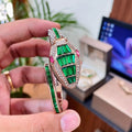 Side angle showing snake-head case of Bvlgari Serpenti watch