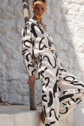 cream abstract print women western coord set front view
