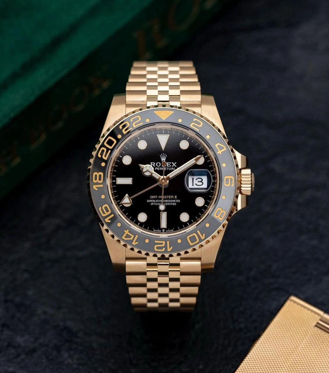 Gold bezel dual time wrist watch
