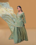 Close view of zari embroidery on kurti

