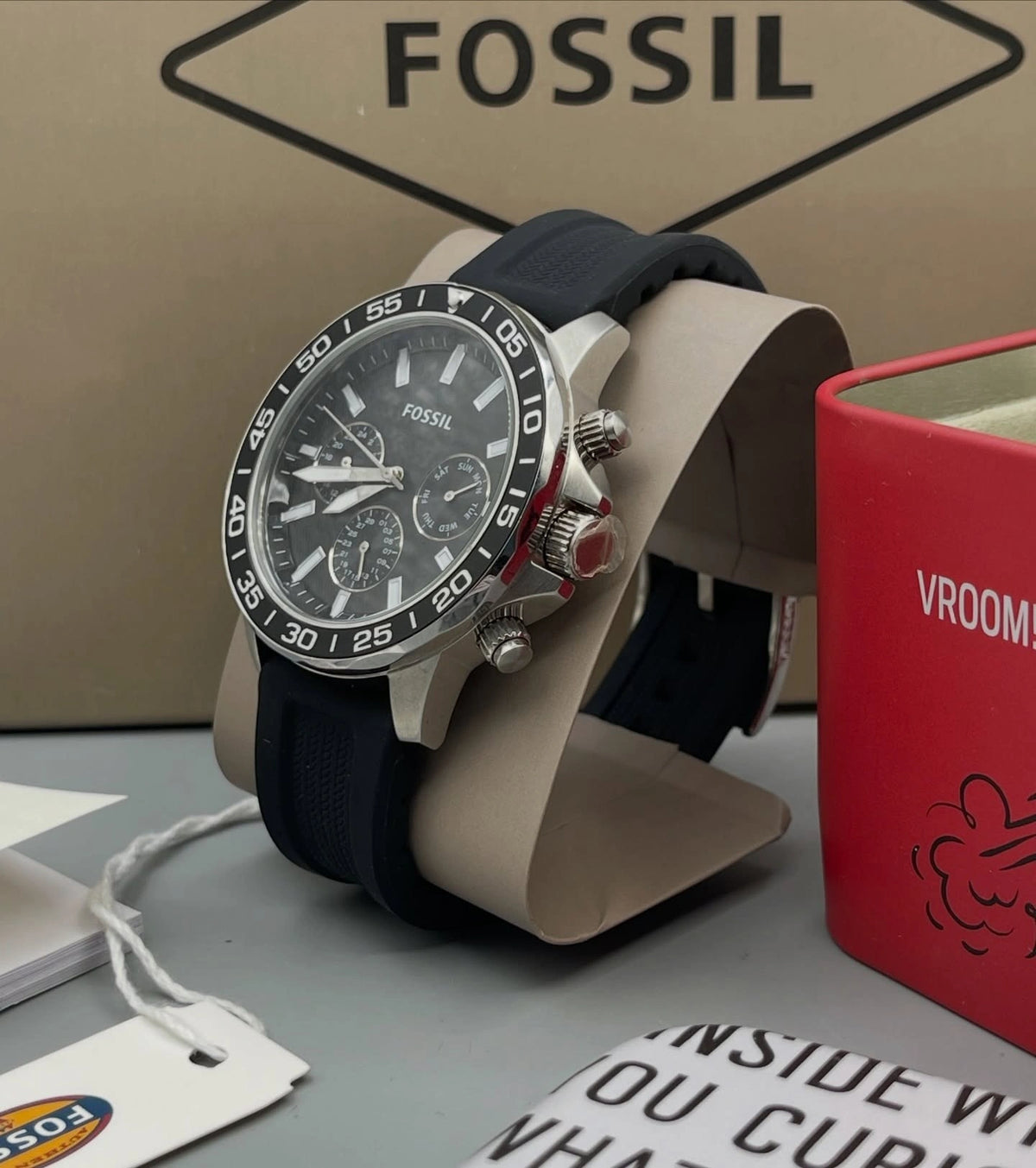 Fossil men's sport watch with black silicone strap.