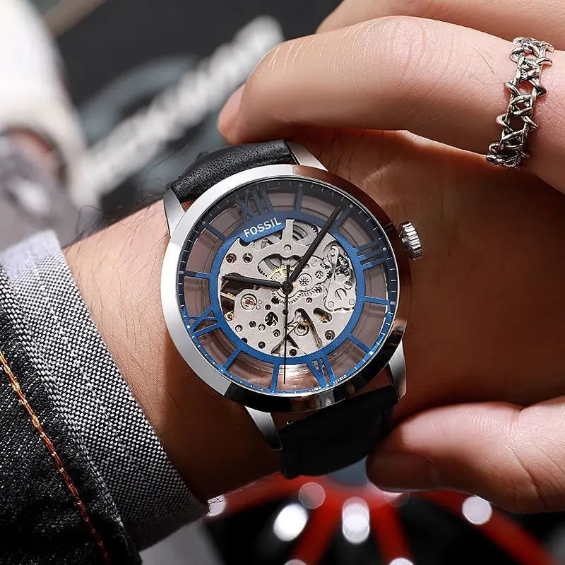 Luxury men's watch with brown leather strap and stainless steel case