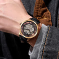 Side profile of Fossil Townsman watch highlighting leather strap