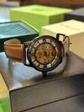 Transparent case back revealing the self-winding mechanism
