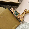 Women emerald dial bracelet watch
