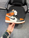 High-top streetwear sneakers in orange and black colorway