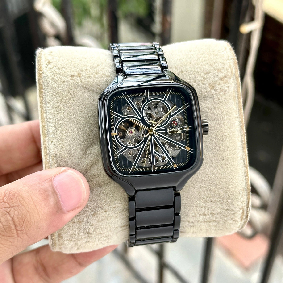 Skeleton dial men's watch with matching metal bracelet