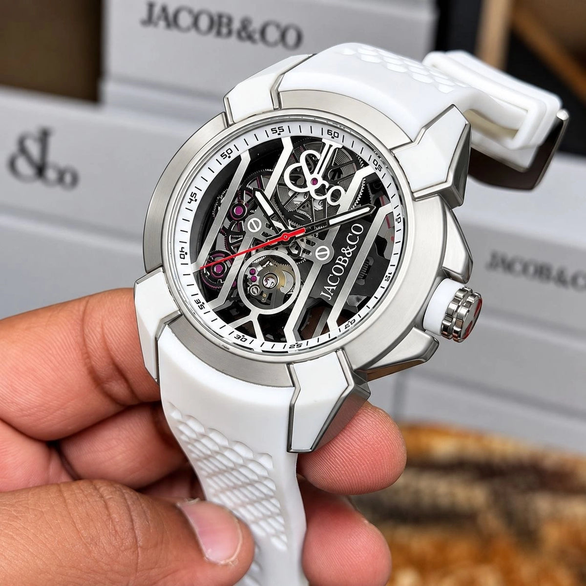Rose gold-tone wristwatch with deployment-style clasp