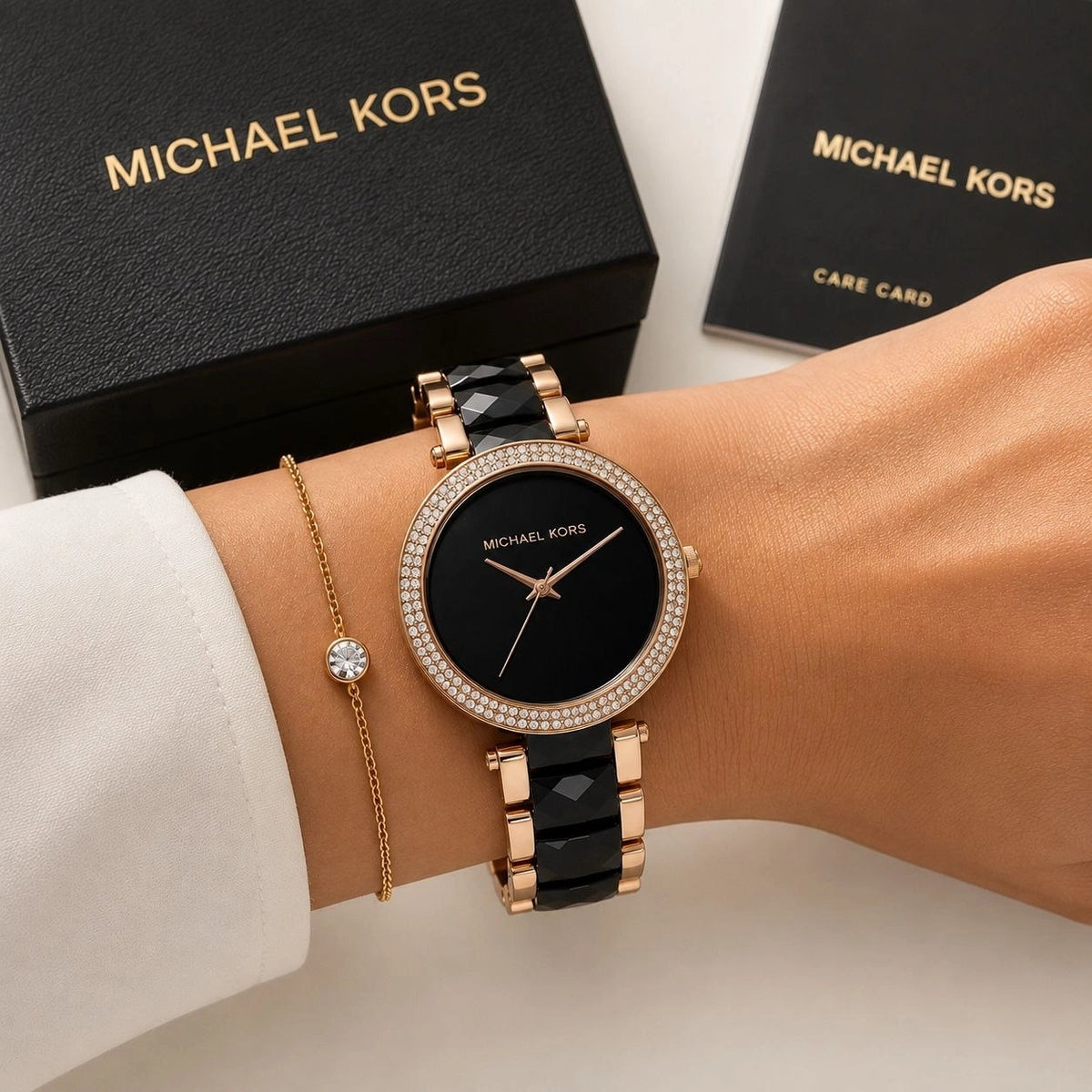Women's Michael Kors watch with decorative crystal-style bezel.