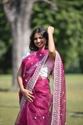 Close-up of multicolor embroidery on saree