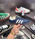 Navy sneaker close up leather upper