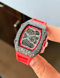 Luxury men's watch with red silicon strap and skeleton dial