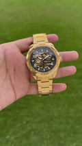 Gold metal strap skeleton watch

