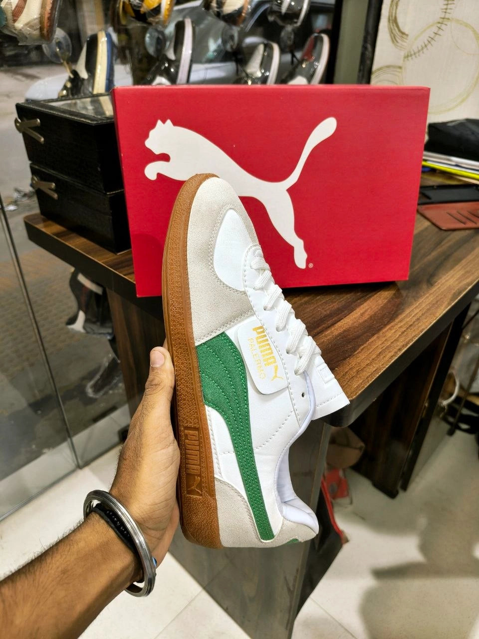 Men's low-top white sneakers with green side detailing