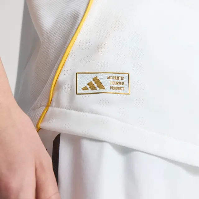 Real Madrid club crest on football jersey