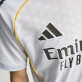 Model wearing Real Madrid home jersey