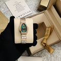 Rose gold serpenti style women watch green dial
