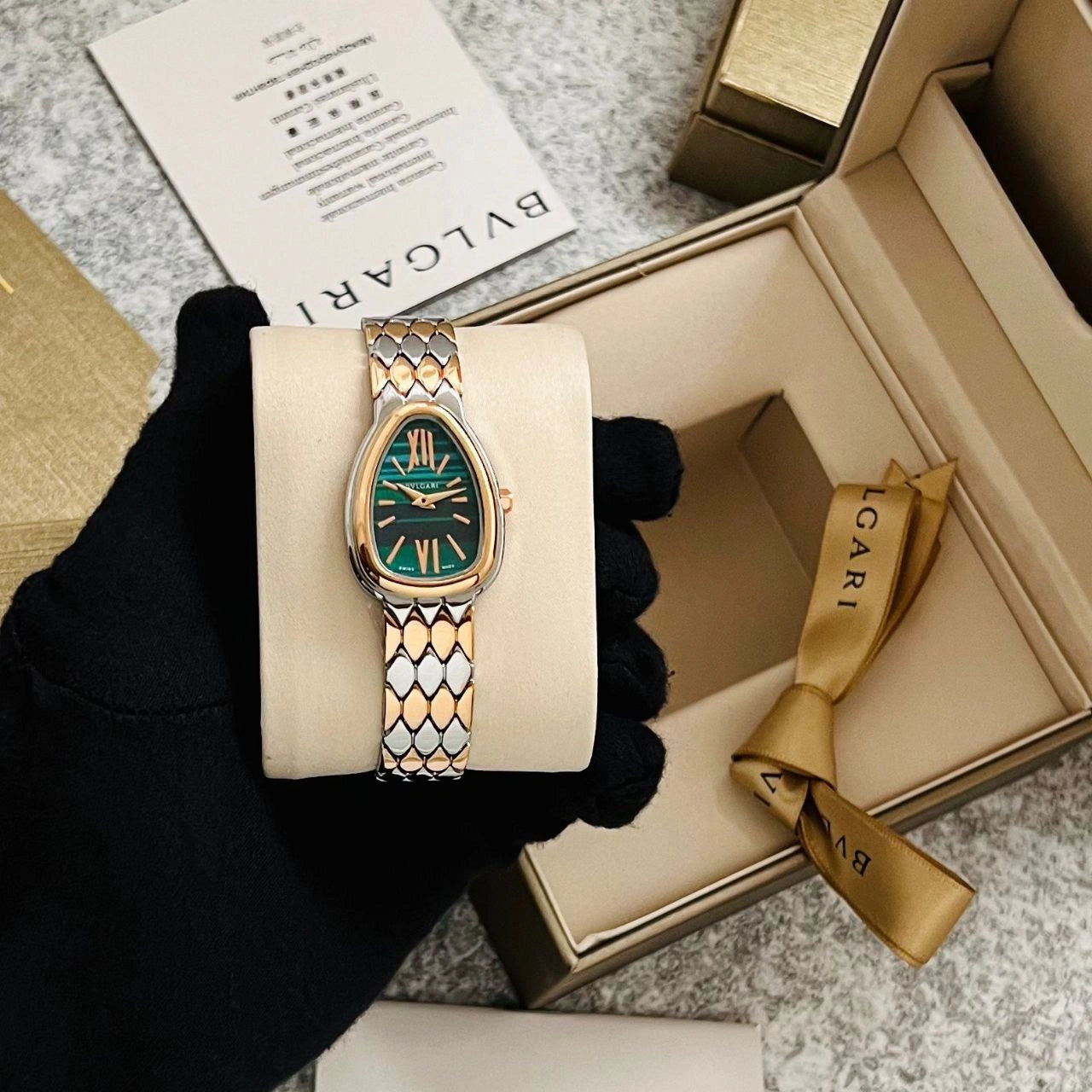 Rose gold serpenti style women watch green dial
