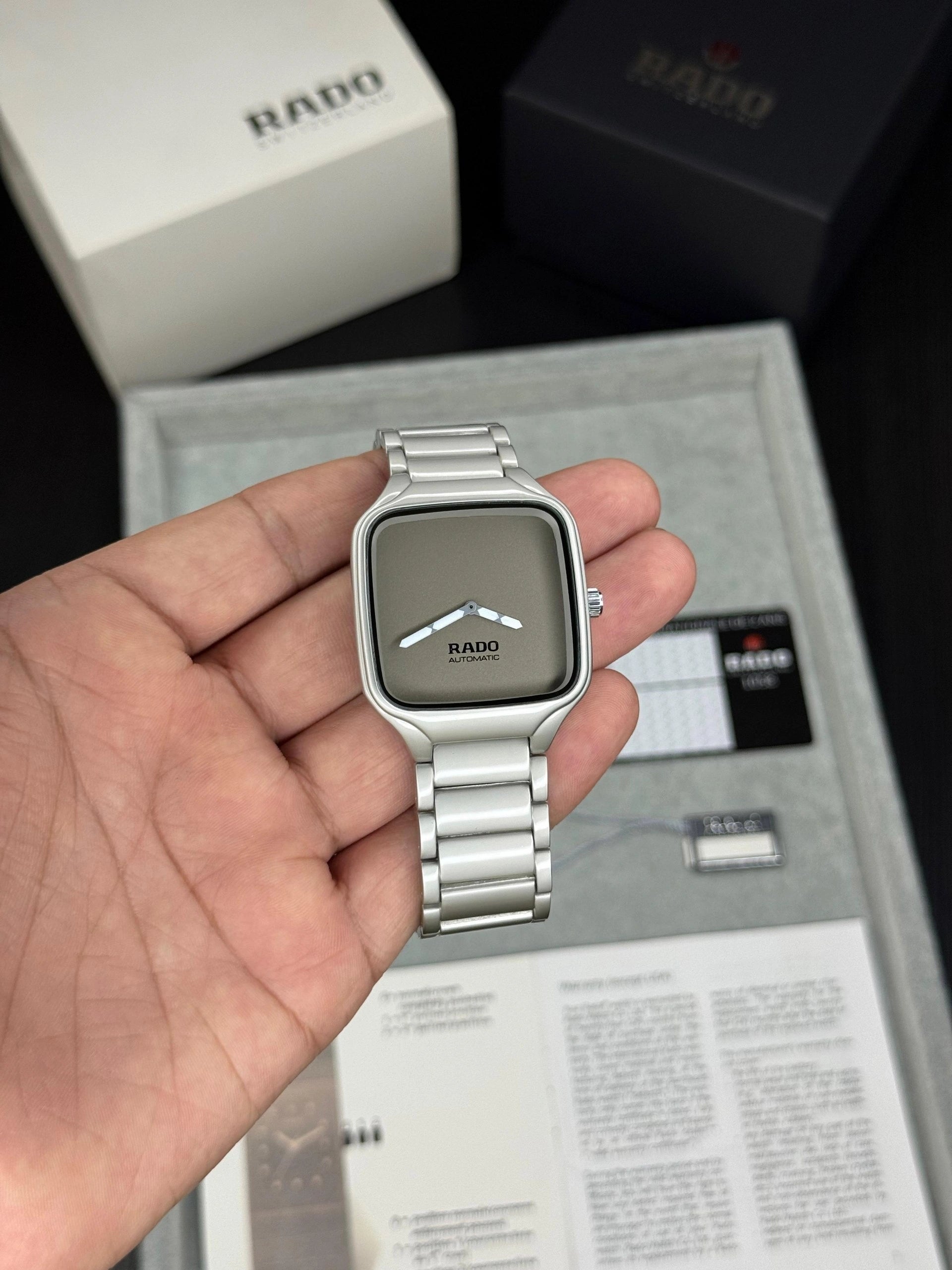 Silver metal strap watch with grey dial