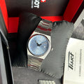 Men's luxury watch with blue dial and silver bracelet
