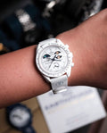 White dial men's chronograph-style wristwatch with black detailing