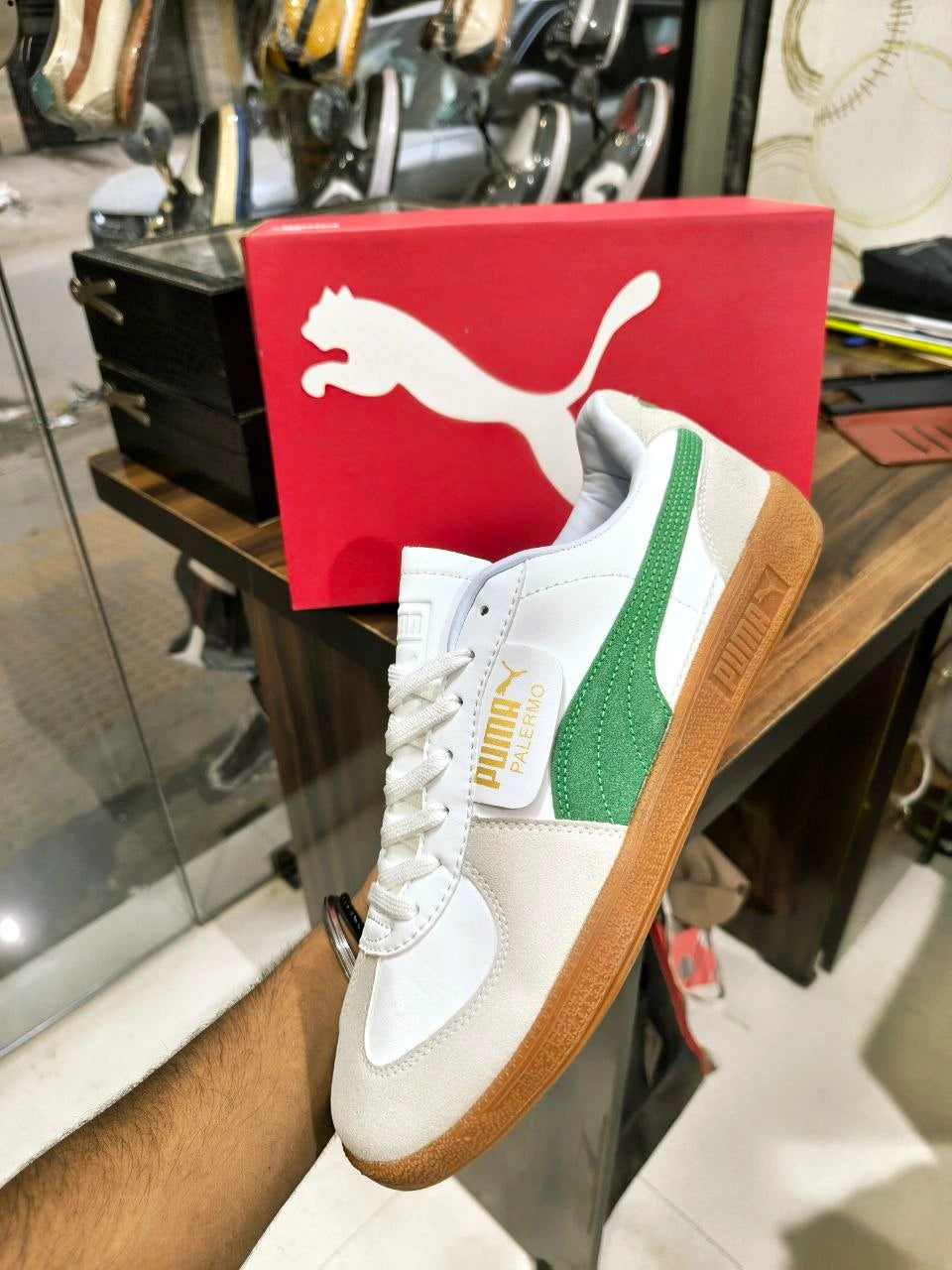 White and green casual sneakers with gum sole