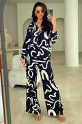women abstract print korean bsy coord set black front view