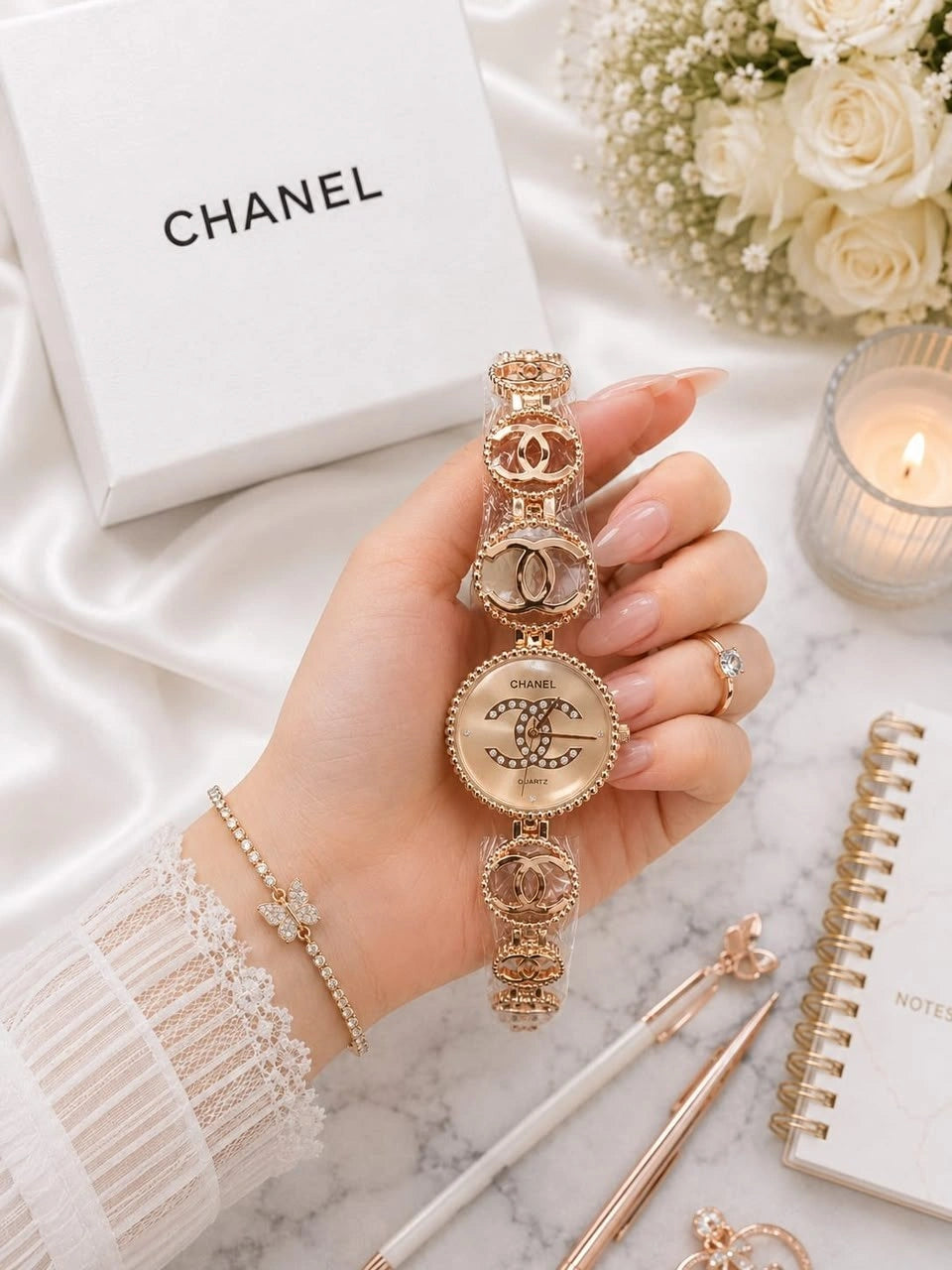 Women's gold-tone bracelet watch with decorative crystal dial