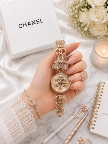 Women's gold-tone bracelet watch with decorative crystal dial